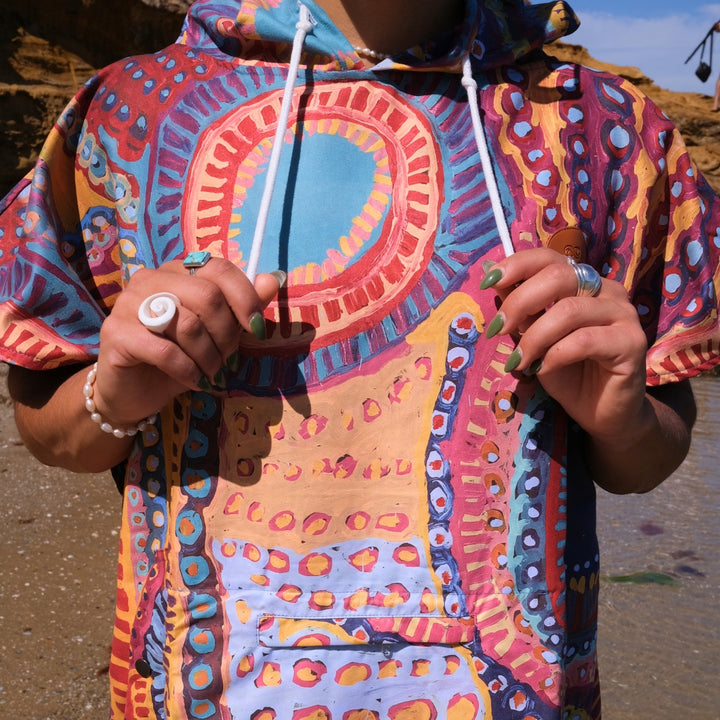 Colourful poncho adult changing